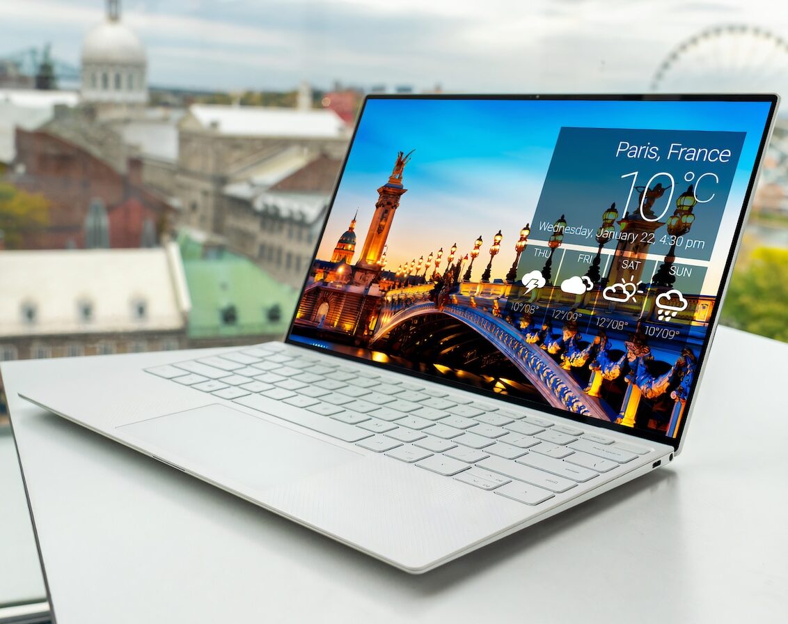 laptop on white table